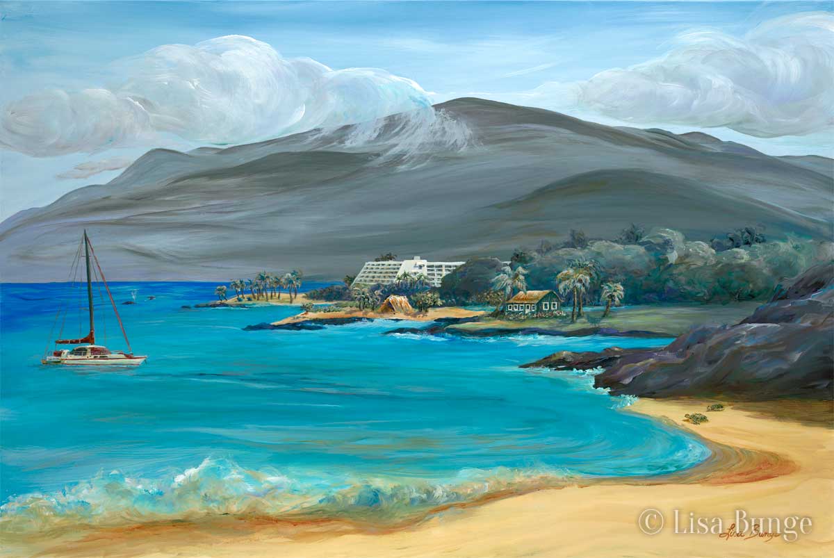 A sailboat bobs in the clear waters on the Kohala coast